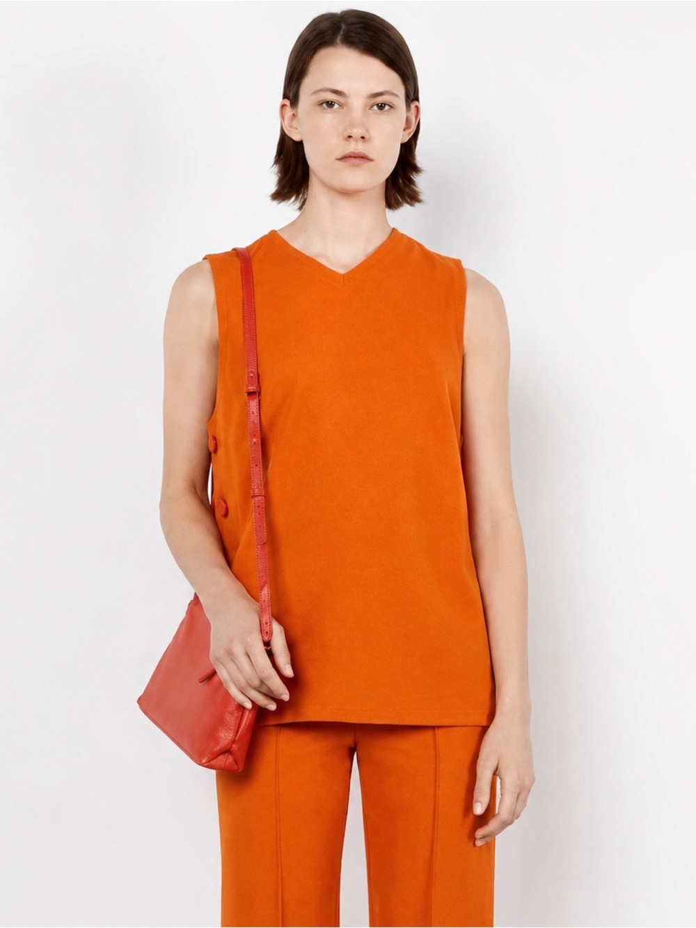 Zara Orange top with side buttons size XS